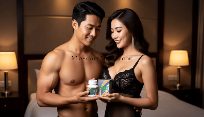 Attractive couple holding male enhancement pills.