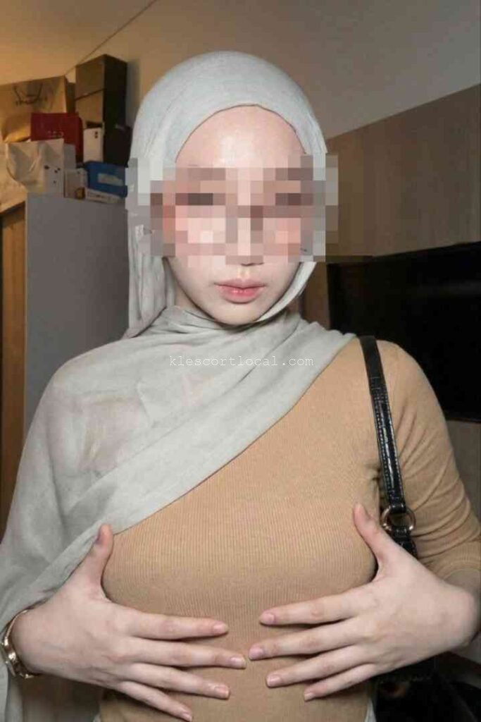 Woman in hijab and tan top, Bukit Bintang KLCC Petaling Jaya