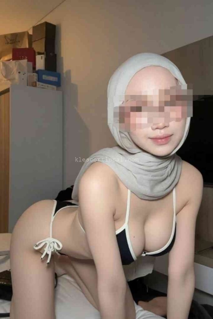 Woman in hijab and bikini posing, Bukit Bintang KLCC Petaling Jaya